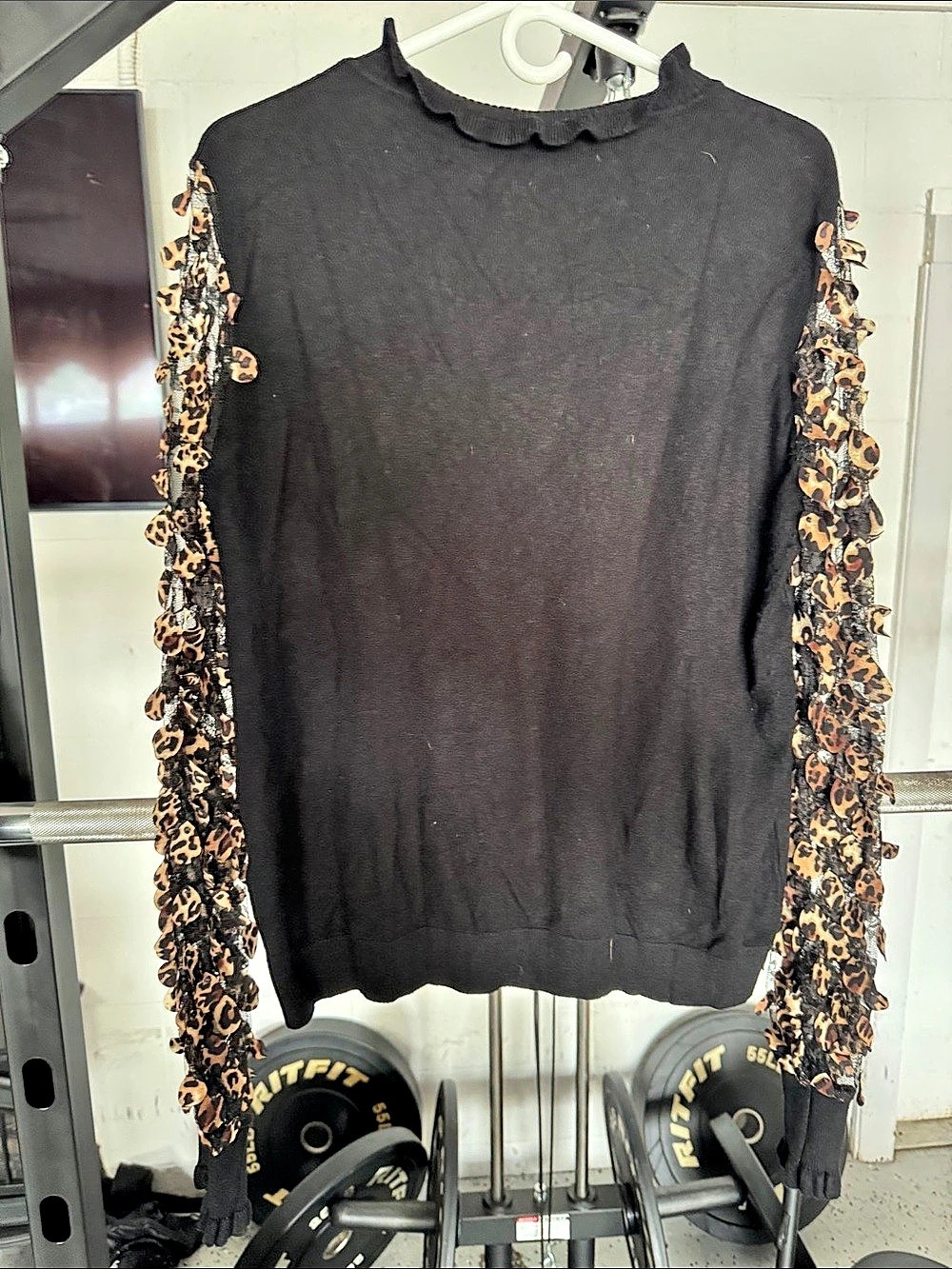 Sioni Leopard Print Sheer Sleeve Mock Neck Sweater